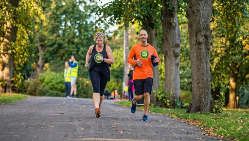 Andy and a client running in castle park colchester